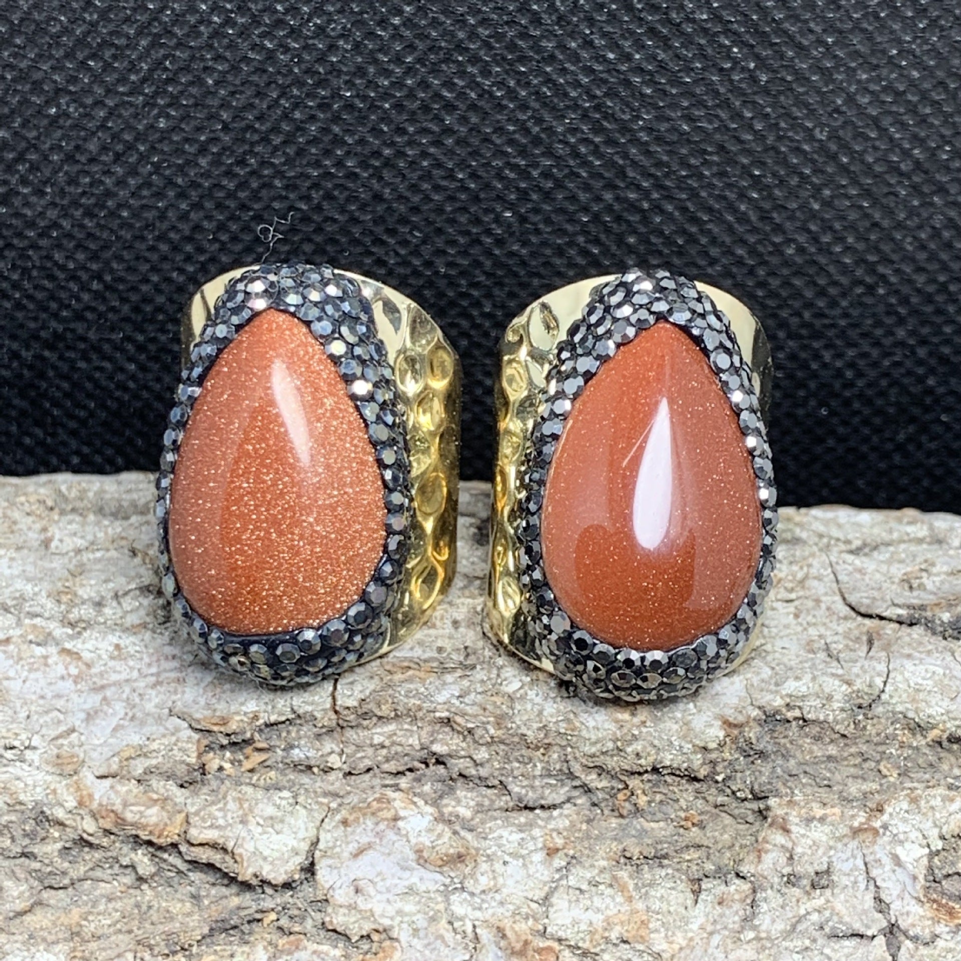 Radiant Goldstone Spiritual Statement Ring with Gold Accents