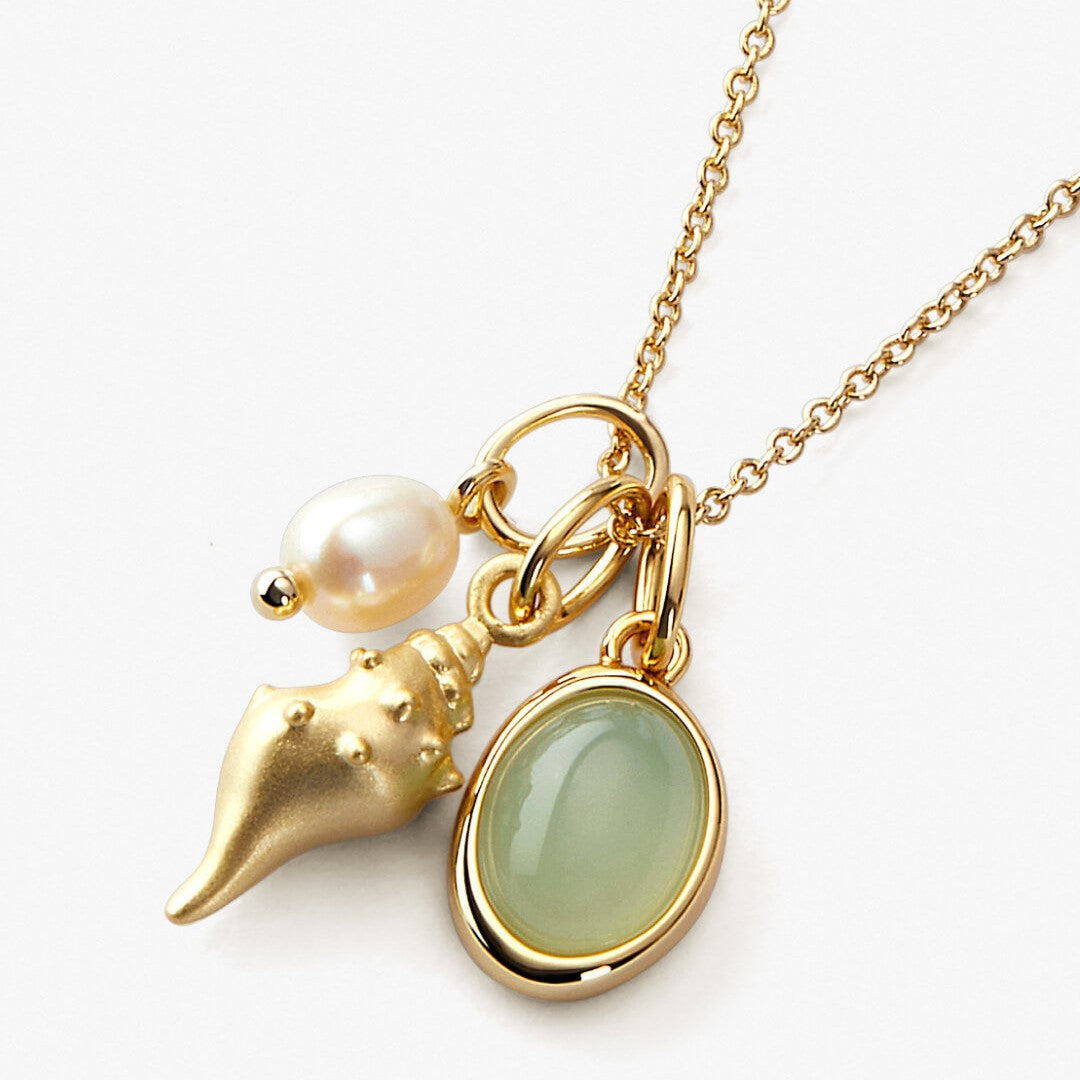 Elegant Charm Necklace with Seashell, Pearl, and Green Gemstone – Timeless Coastal Glamour