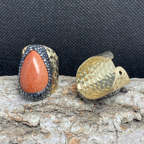 Radiant Goldstone Spiritual Statement Ring with Gold Accents