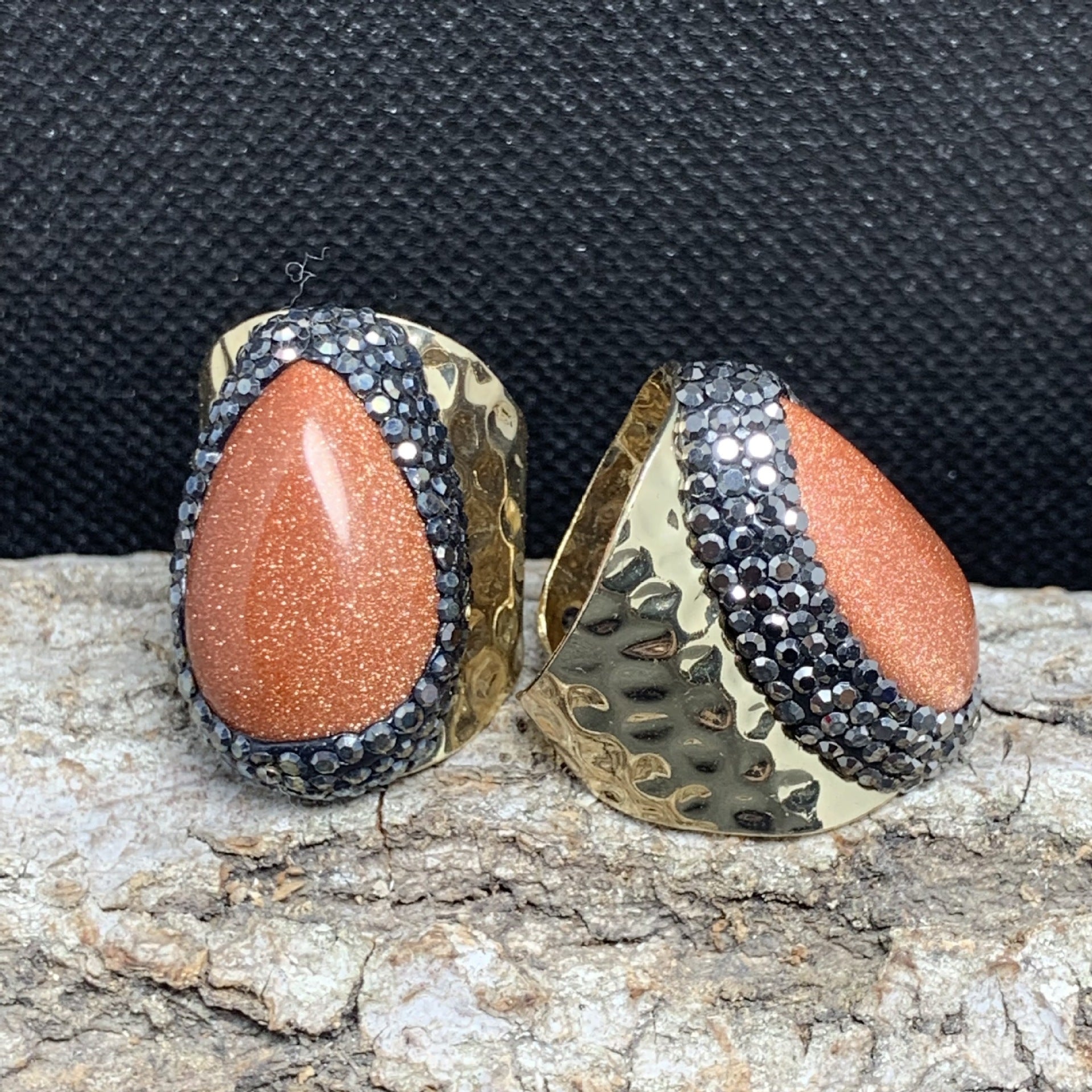 Radiant Goldstone Spiritual Statement Ring with Gold Accents